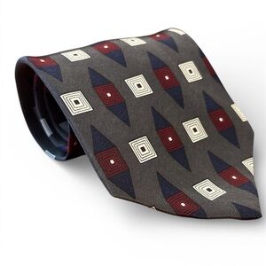 Elegant Geometric Tie in Cream, Red, and Blue